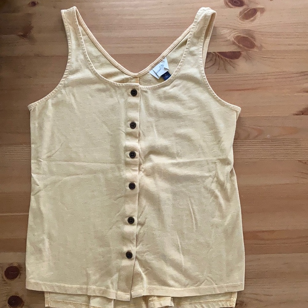Yellow tank with buttons